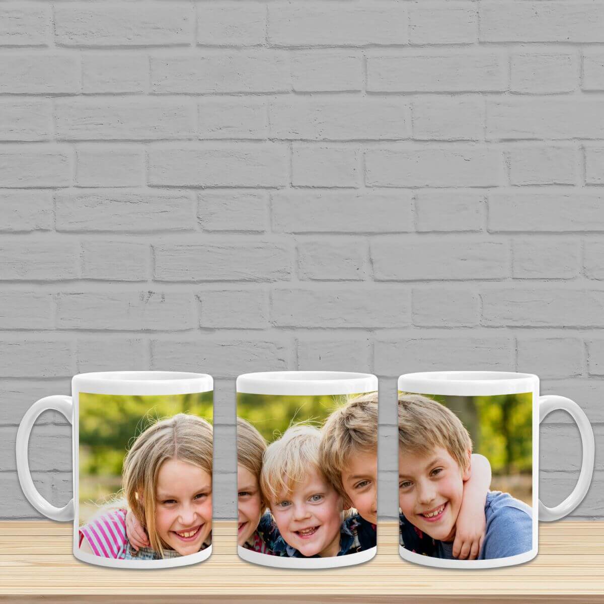 11oz-White-Ceramic-Mug-personalised-3side-view-3kids-park-brick-wall-shelf-bgnd